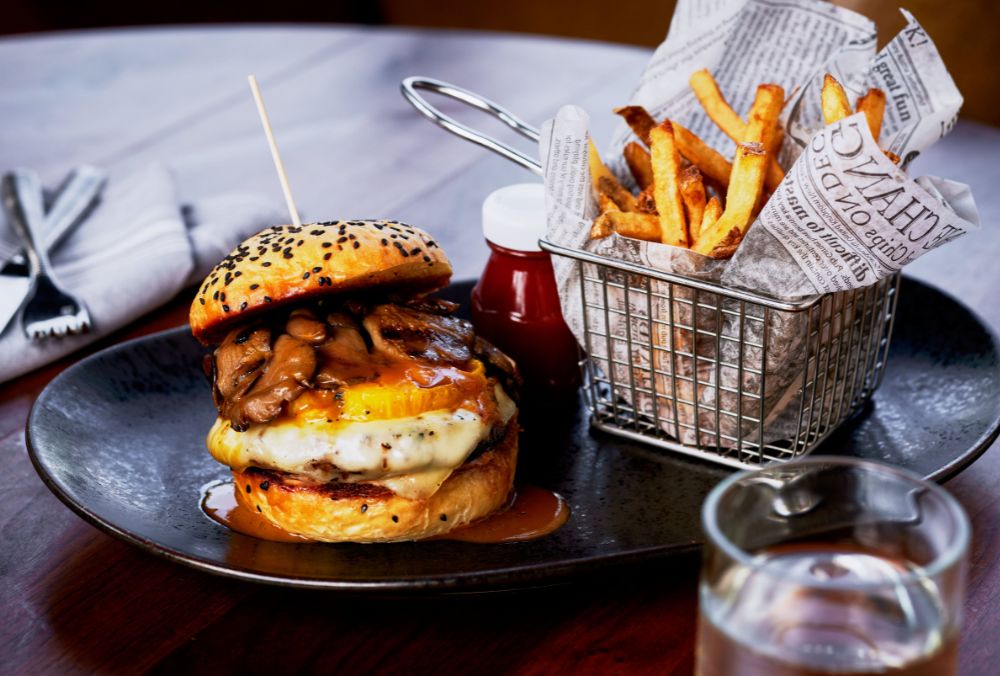 Cheese burger with fries on the side